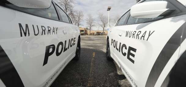 Murray officer found justified in shooting man who threw knives at police