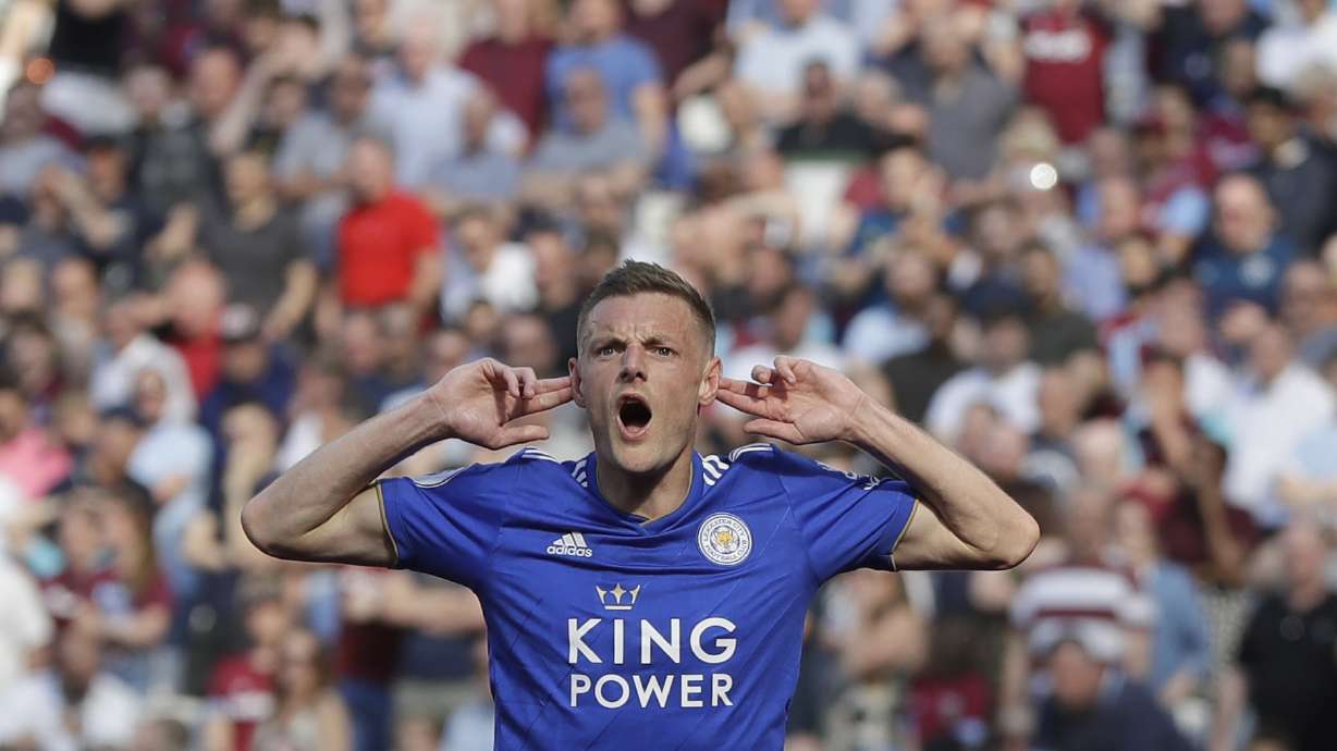 FILE - Leicester City's Jamie Vardy celebrates after scoring his sides 1st goal of the game during the English Premier League soccer match between West Ham and Leicester City at the London stadium in London, Saturday, April 20, 2019.