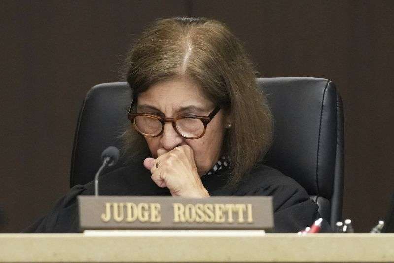 Judge Victoria A. Rossetti listens to Tracy Hartlieb while Hartlieb reads a victim impact statement during the sentencing hearing for Robert E. Crimo III., at the Lake County Courthouse, in Waukegan, Ill., Wednesday.