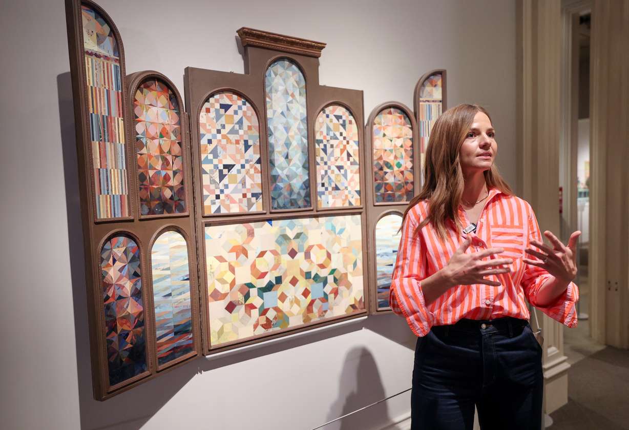 Artist Paige Crosland Anderson talks about her piece, “Sacred Mending,” at “Lift Up the Hands Which Hang Down,” the 13th International Art Competition of The Church of Jesus Christ of Latter-day Saints, at the Church History Museum in Salt Lake City on Thursday.