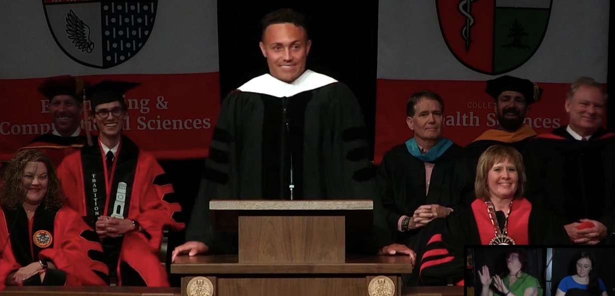 Pittsburgh Steelers player and SUU alumni Miles Killebrew speaks at the university's 2025 graduation ceremony Thursday.