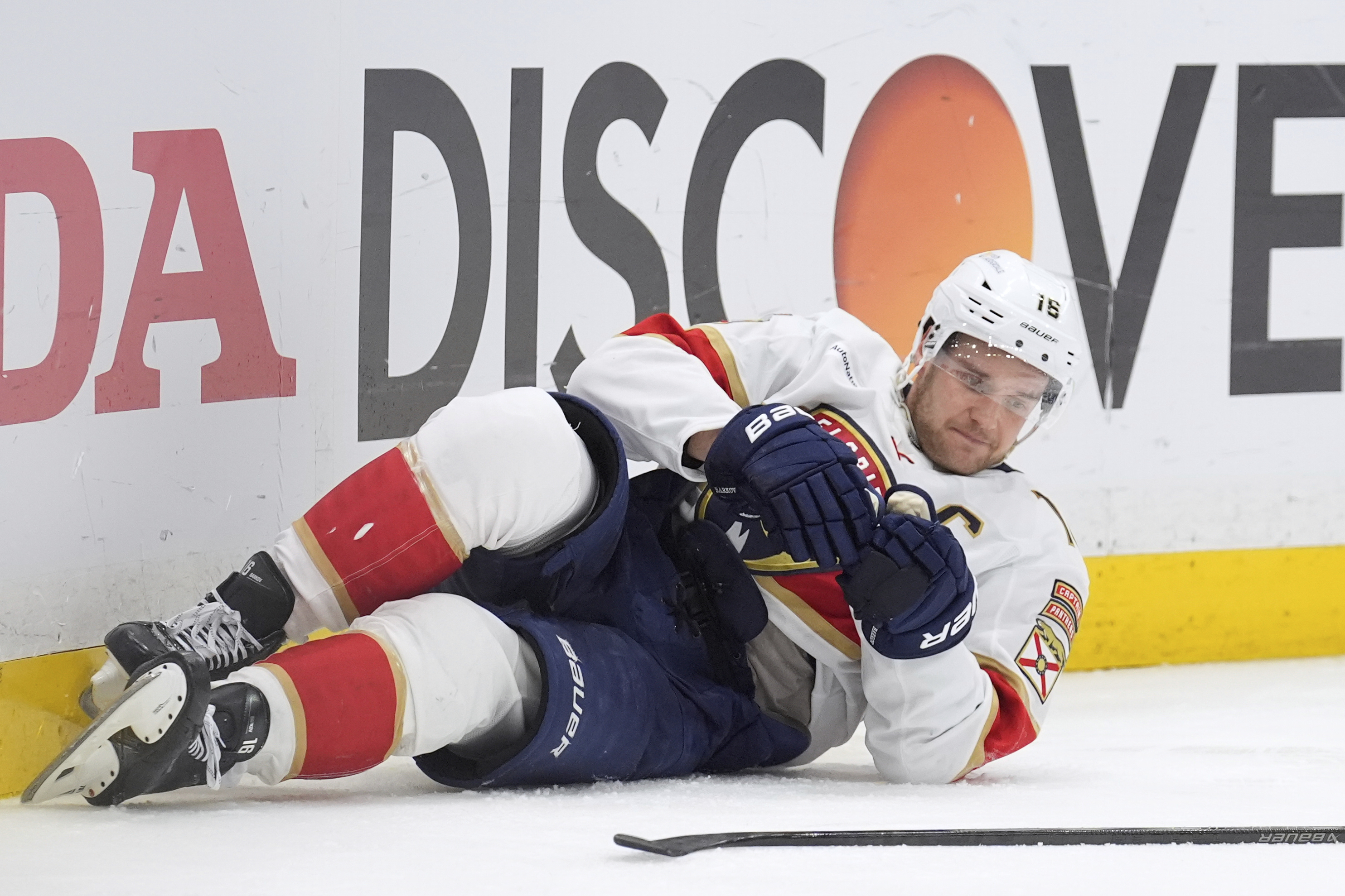 Barkov misses final 10 minutes of Panthers' win after taking hit from Lightning's Hagel