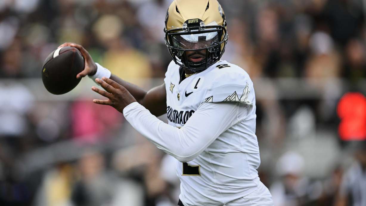 FILE - Colorado quarterback Shedeur Sanders (2) throws a pass against Central Florida during the first half of an NCAA college football game, Saturday, Sept. 28, 2024, in Orlando, Fla.