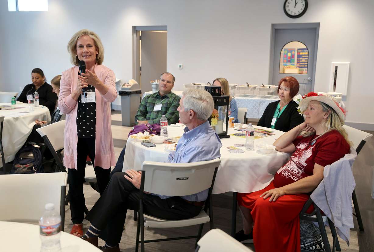 Molly Wetzel, Salt Lake communications council co-director for The Church of Jesus Christ of Latter-day Saints, speaks at a Salt Lake Interfaith Roundtable luncheon at the Islamic Center in West Jordan on Wednesday.