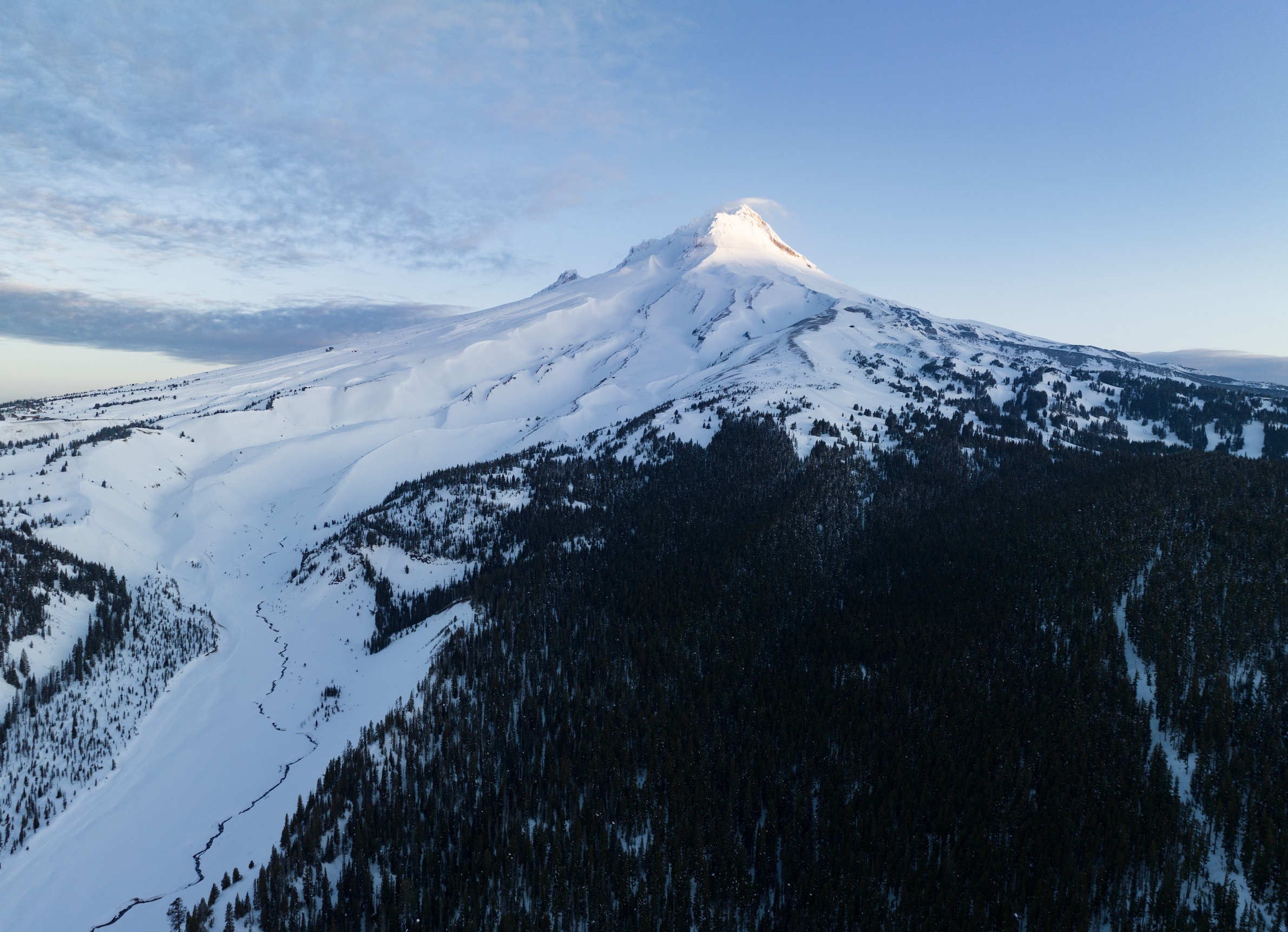 Snow covers Mt Hood, about 50 miles southeast of Portland, Oregon. The latest snowpack season was big for the Pacific Northwest, but less than ideal for the Southwest.