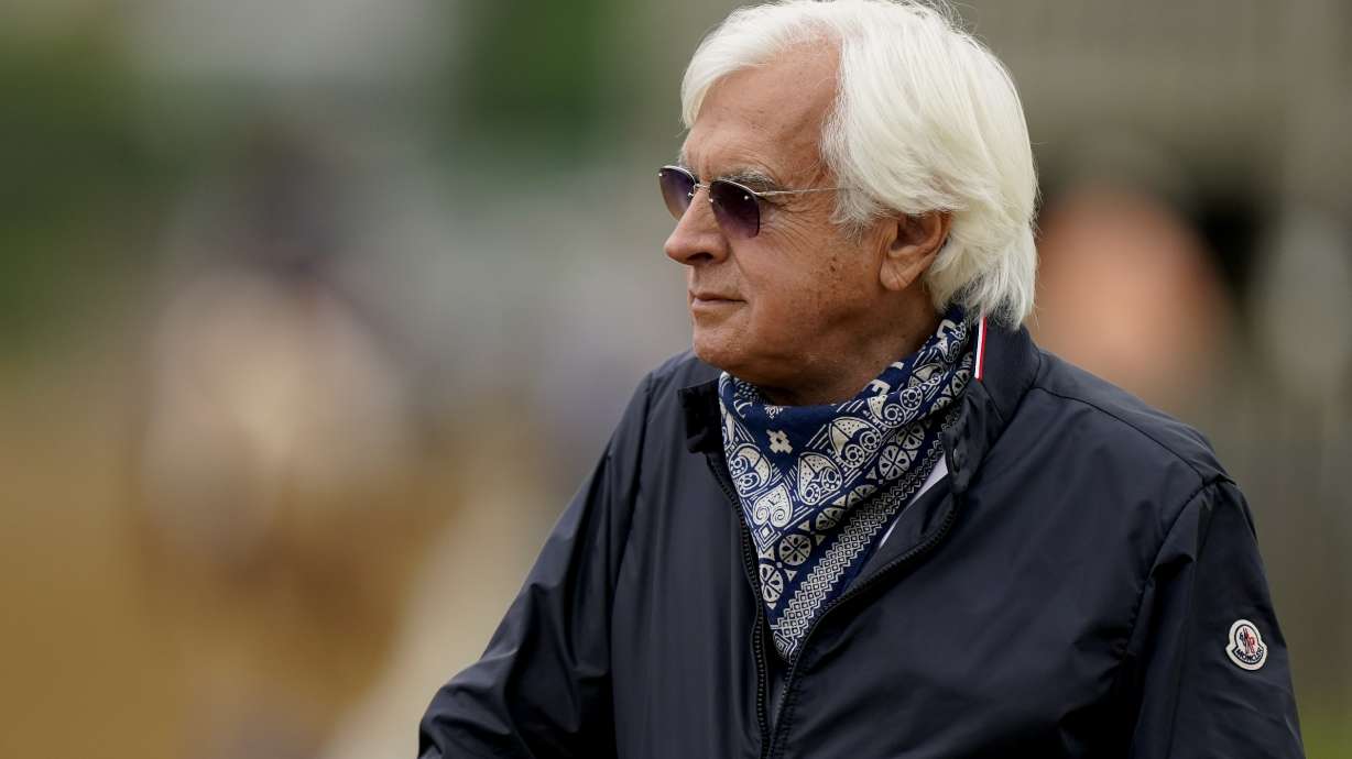 FILE - Trainer Bob Baffert watches workouts at Churchill Downs Wednesday, April 28, 2021, in Louisville, Ky.