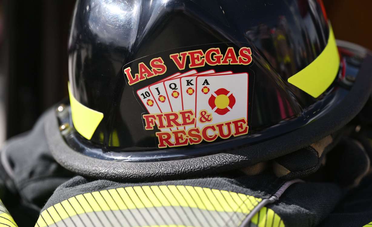 A Las Vegas Fire and Rescue helmet sits near the start line as firefighters compete for time in the SERVPRO FCL 2025 West Region Classic in the TFT Firefighter Challenge Championship Series, at the Utah State Fairpark in Salt Lake City on Friday.