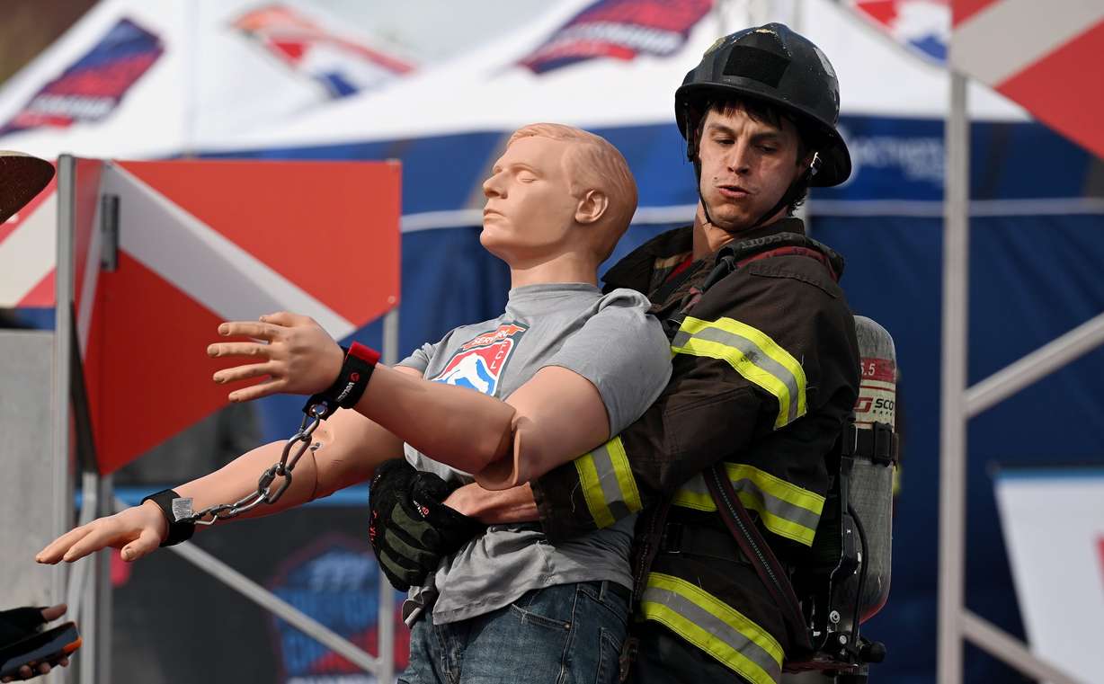 Missoula Fire Department firefighter Quinlan Roe pulls a weighted mannequin as he competes in the SERVPRO FCL 2025 West Region Classic in the TFT Firefighter Challenge Championship Series, at the Utah State Fairpark in Salt Lake City on Friday.