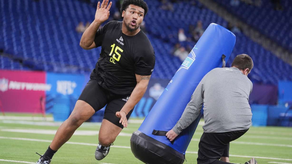 FILE - Oregon defensive lineman Derrick Harmon runs a drill at the NFL football scouting combine in Indianapolis, Thursday, Feb. 27, 2025.