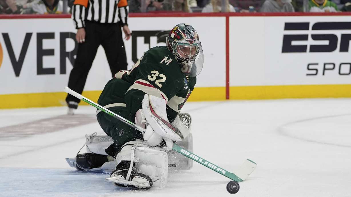 Minnesota Wild goaltender Filip Gustavsson (32) defends against a shot during the second period of Game 3 of a first-round NHL hockey playoff series against the Vegas Golden Knights, Thursday, April 24, 2025, in St. Paul, Minn.