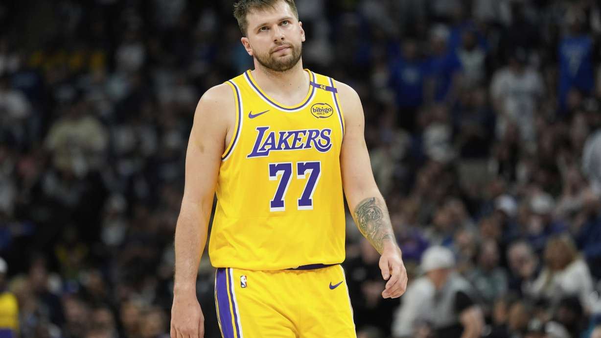 Los Angeles Lakers guard Luka Doncic reacts after a Lakers turnover during the first half of Game 3 of an NBA basketball first-round playoff series agains the Minnesota Timberwolves, Friday, April 25, 2025, in Minneapolis.