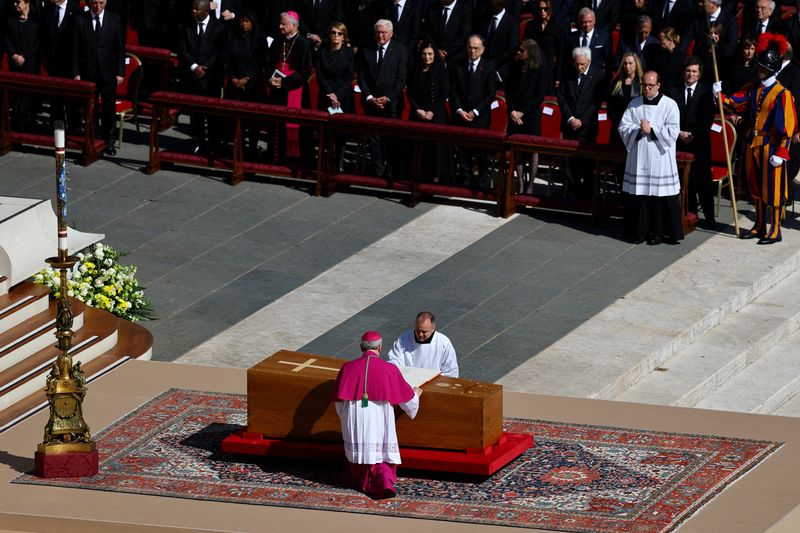 Members of the clergy attend the funeral Mass of Pope Francis in St. Peter's Square at the Vatican, Saturday.