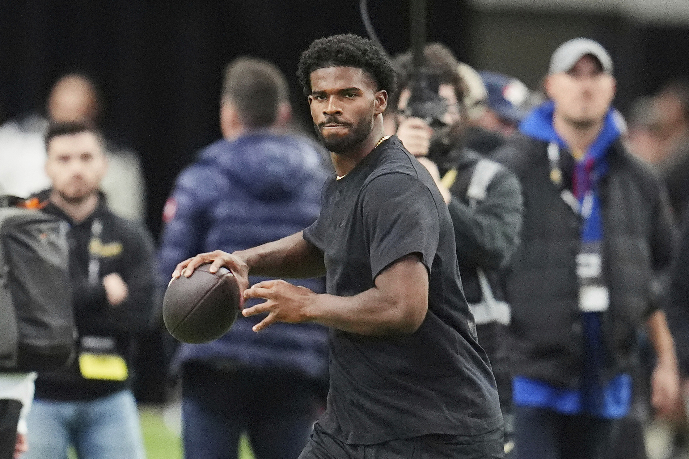 FILE - Colorado quarterback Shedeur Sanders takes part in passing drills during Colorado's NFL football pro day Friday, April 4, 2025, in Boulder, Colo.