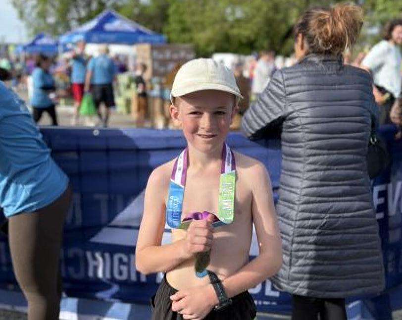 Winston Whitehead, 10, who attends Salt Lake Arts Academy, ran the Salt Lake City Half Marathon on Saturday as a member of Teens Run SLC.