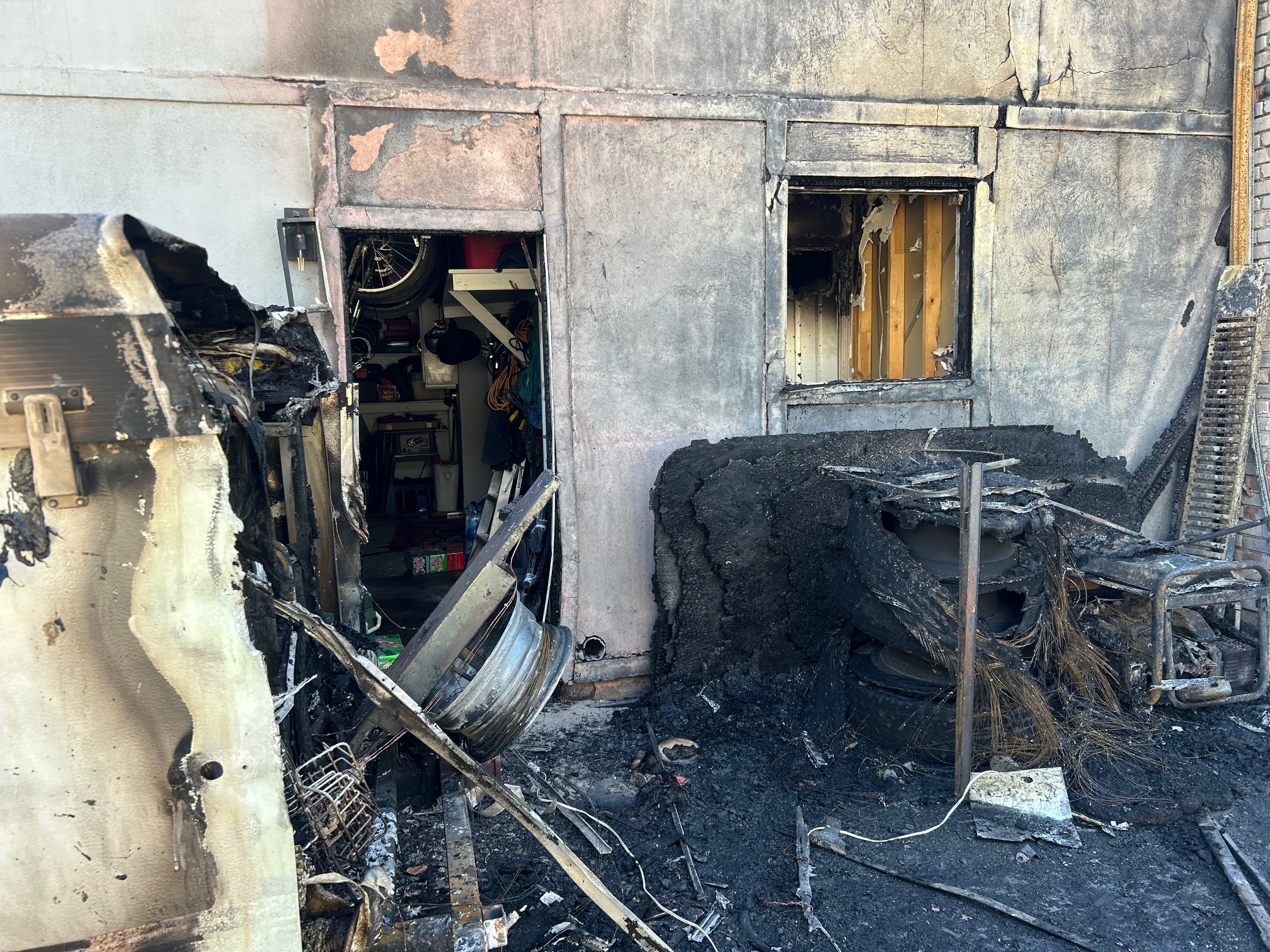 The damage caused by a two-alarm fire in Granite Hills Circle in Sandy on Saturday.
