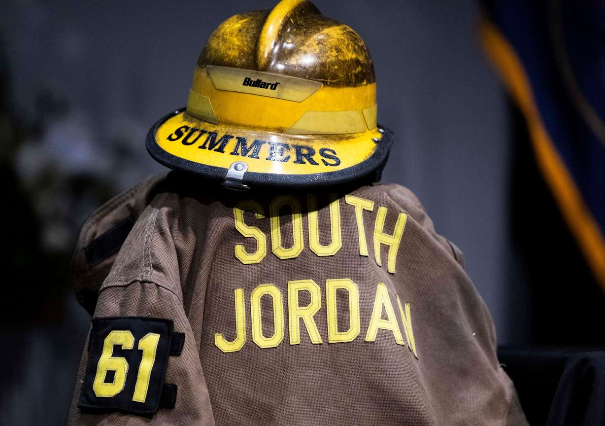 South Jordan firefighter Corban Summers’ turnout gear is displayed during a funeral service for Summers at Hunter High School in West Valley City on Saturday.