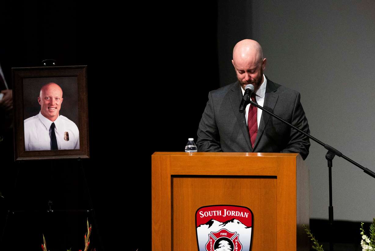 South Jordan firefighter Corban Summers’ brother Skylar Summers speaks during a funeral service for Corban Summers at Hunter High School in West Valley City on Saturday.