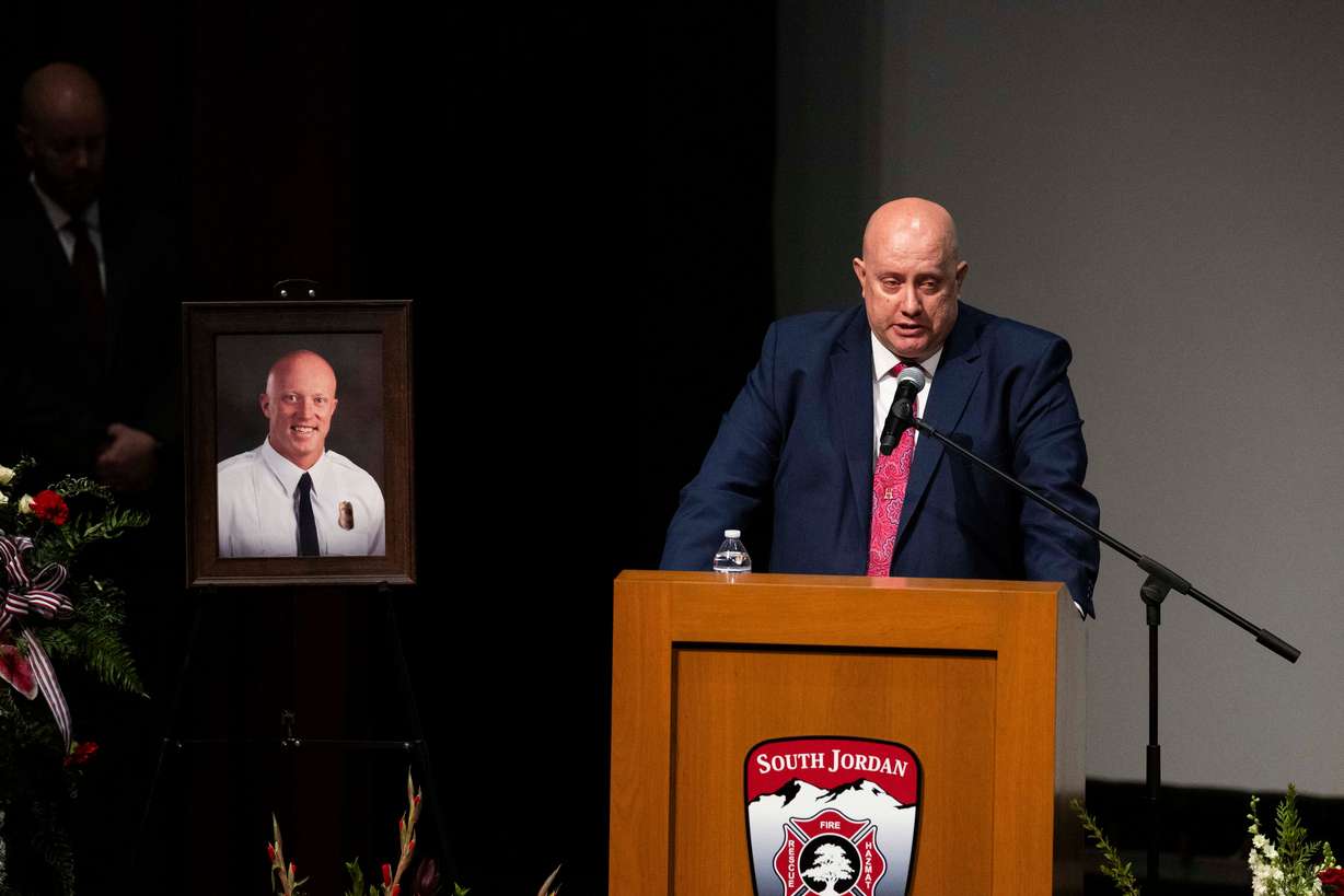 South Jordan firefighter Corban Summers’ brother Austin Summers speaks during a funeral service for Corban Summers at Hunter High School in West Valley City on Saturday.