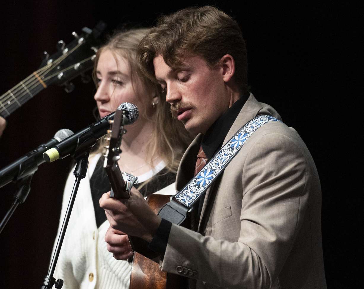 South Jordan firefighter Corban Summers’ son Dallin Summers performs during a funeral service for his father at Hunter High School in West Valley City on Saturday.