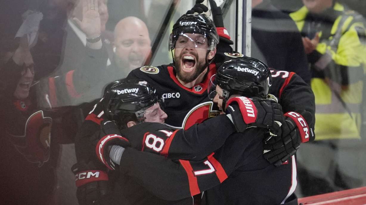 Ottawa Senators' David Perron (57) celebrates his goal with Adam Gaudette (81) and Brady Tkachuk (7) after scoring against the Toronto Maple Leafs during third period NHL playoff action in Ottawa, Saturday, April 26, 2025.