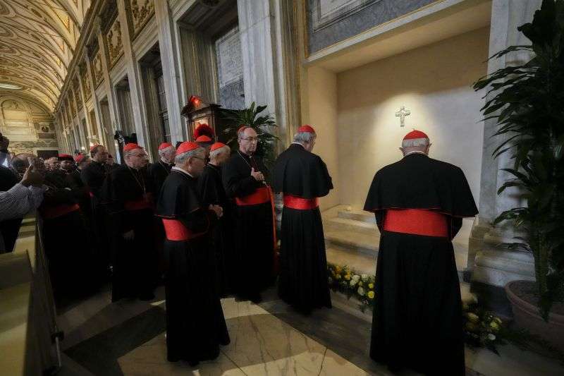 Cardinals visit the tomb of late Pope Francis inside St. Mary Major Basilica in Rome, Sunday.
