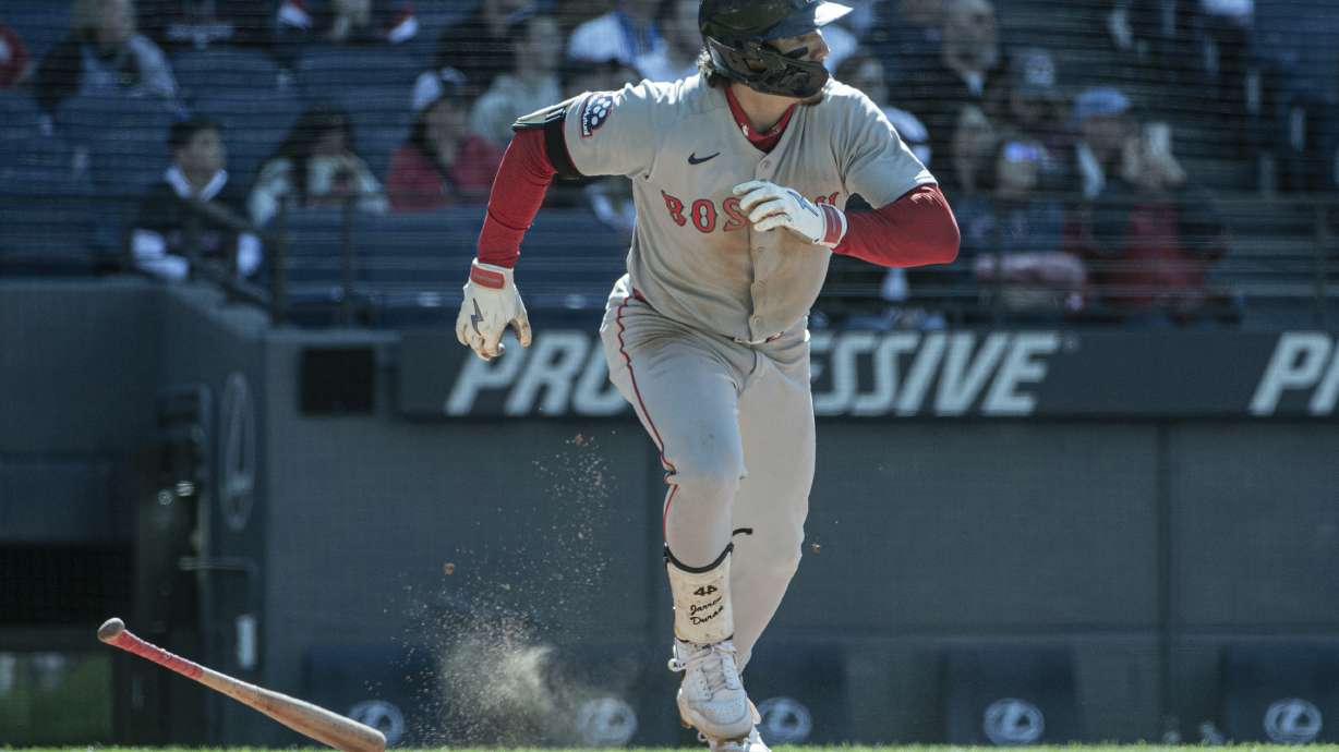Boston Red Sox's Jarren Duran watches his RBI double off Cleveland Guardians relief pitcher Austin Hedges during the ninth inning of a baseball game Sunday, April 27, 2025, in Cleveland.