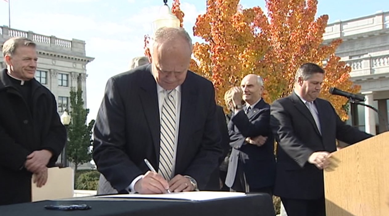 Community leaders gather to sign a document known as the Utah Compact at the State Capitol in Salt Lake City, Nov. 11, 2010.