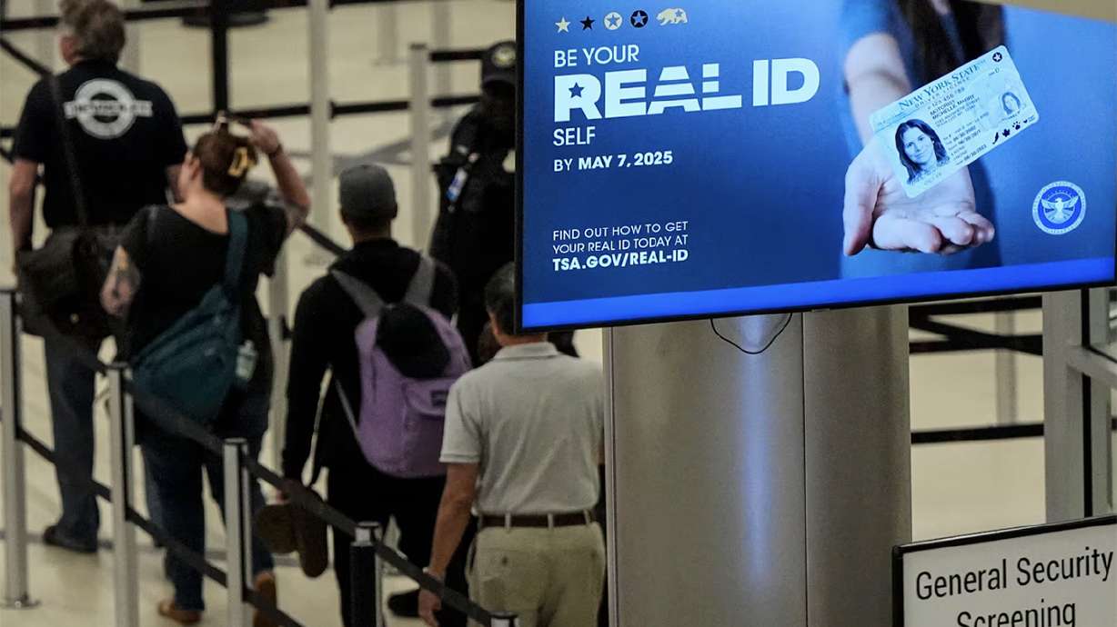 Travelers move through Hartsfield-Jackson Atlanta International Airport ahead of Memorial Day, May 24, 2024, in Atlanta. Real IDs will officially be required at TSA security checkpoints starting May 7.