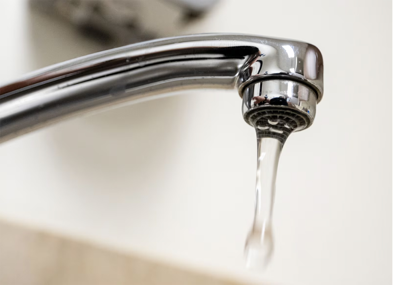 Water runs through a faucet in Salt Lake City on March 31. Utah residents weigh in on fluoride ban in new poll.