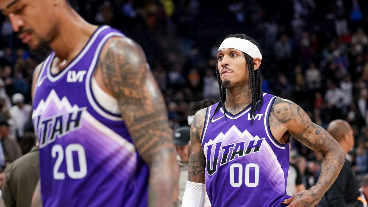 Utah Jazz forward John Collins (20) and guard Jordan Clarkson (00) come off the court after losing to the LA Clippers at the Delta Center in Salt Lake City on Friday, Dec. 8, 2023.