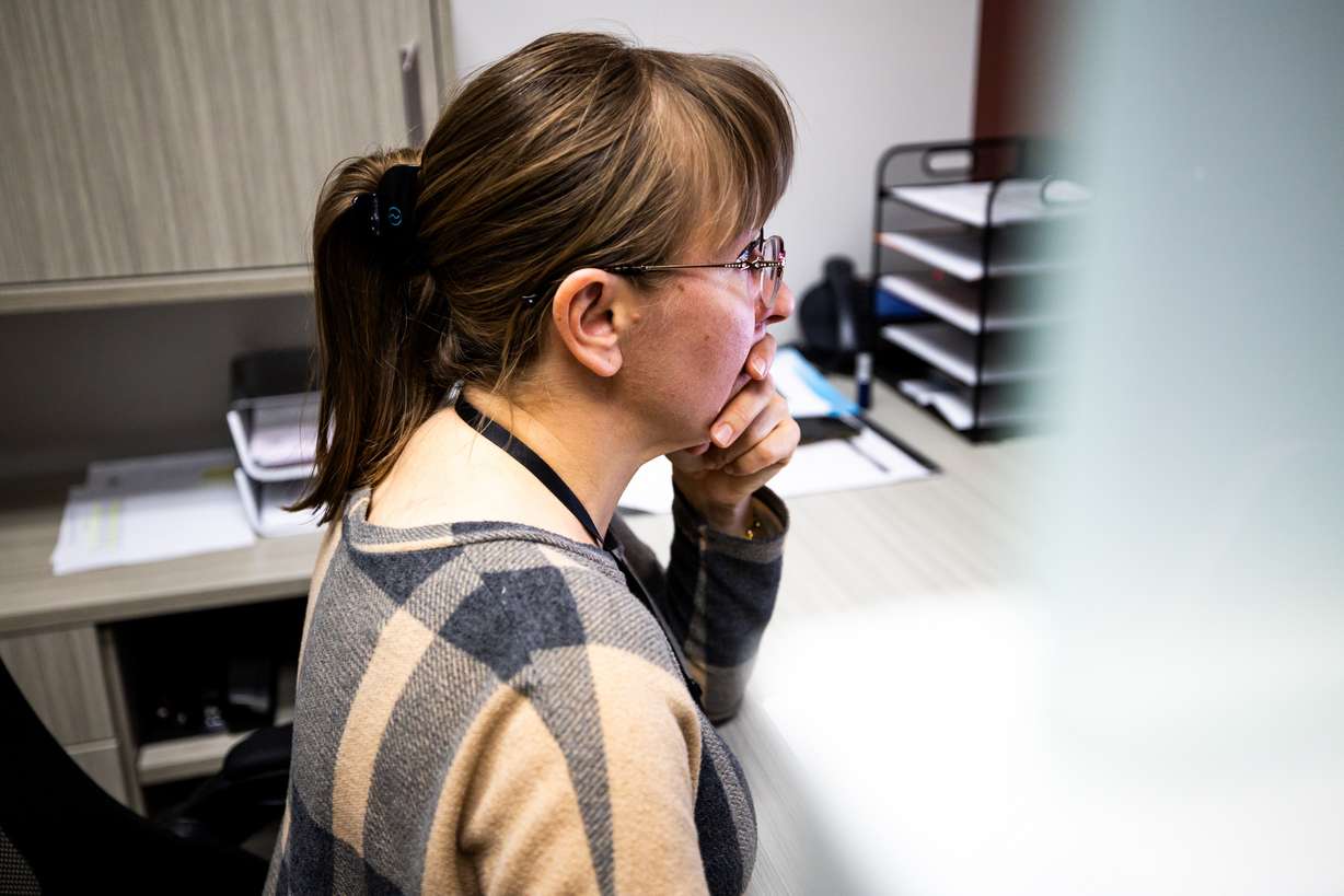 Natalia Chornovol, refugee resettlement case manager, works at Catholic Community Services of Utah in Salt Lake City on Monday.