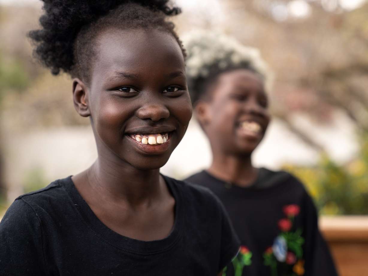 Catholic Community Services of Utah says it will tap private funds to maintain programming for refugees threatened by federal funding cuts. The undated image shows two of the agency's refugee clients.