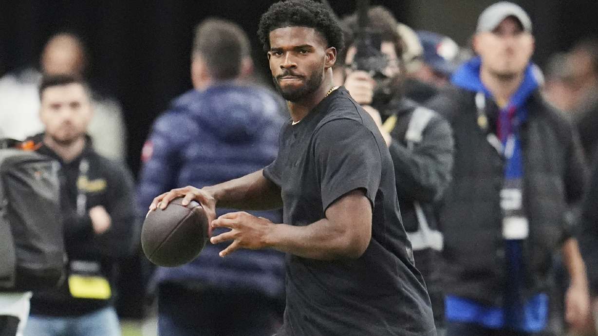 FILE - Colorado quarterback Shedeur Sanders takes part in passing drills during Colorado's NFL football pro day Friday, April 4, 2025, in Boulder, Colo.