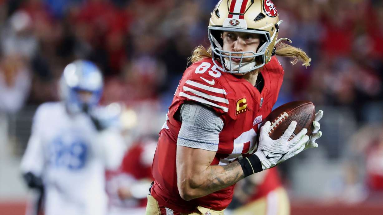 FILE - San Francisco 49ers tight end George Kittle (85) makes a catch during the second half of an NFL football game against the Detroit Lions, Monday, Dec. 30, 2024, in Santa Clara, Calif.