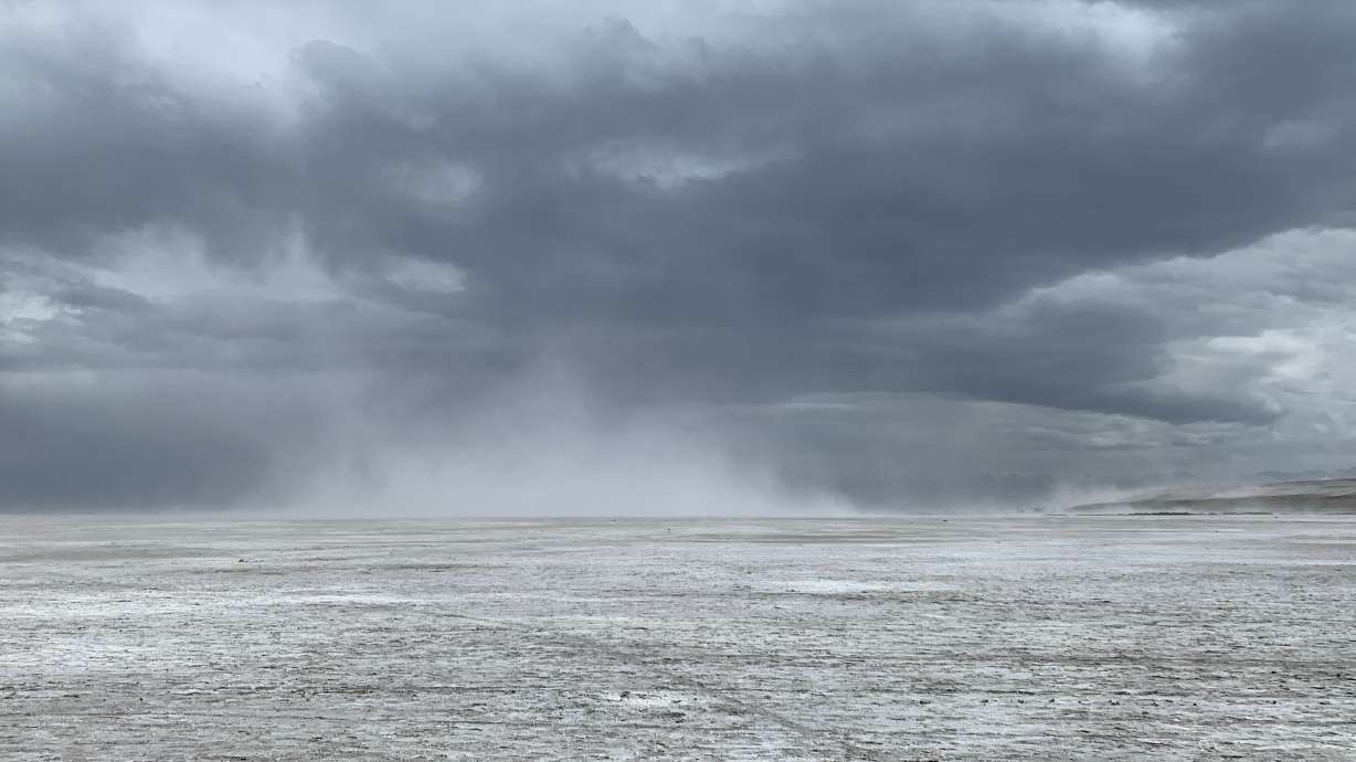 Dust flies off the Great Salt Lake on April 27, 2025. Utah researchers say a working paper released earlier this year is a "really important first step" in understanding the health costs tied to the lake's dust.