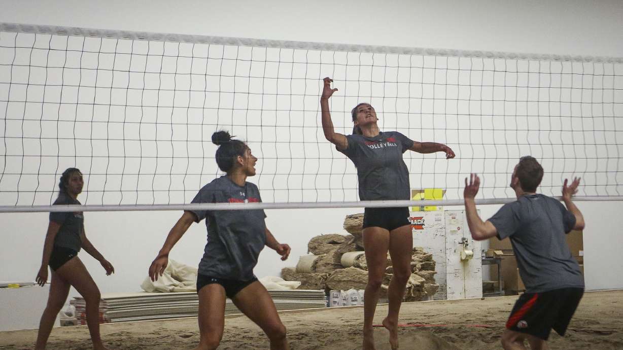 Members of the new Utes sand volleyball team practice in the new beach volleyball gym in Einar Nielsen Fieldhouse on the University of Utah campus in Salt Lake City on Wednesday, Feb. 15, 2017.
