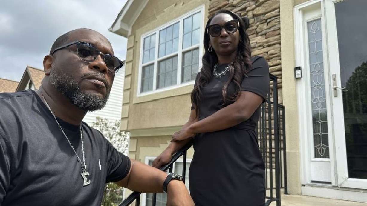 Toi Cliatt and Trina Martin on April 25 stand outside the home where the FBI mistakenly raided in 2017, in Atlanta. The Supreme Court seemed likely Tuesday to rule narrowly in favor of the family.