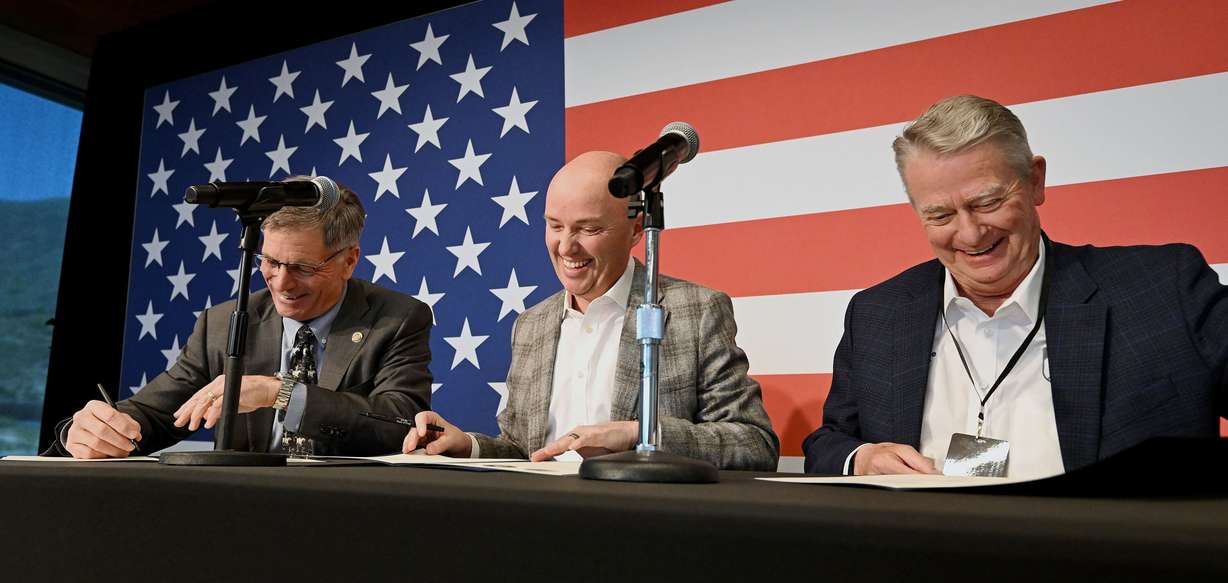 Utah Gov. Spencer Cox, Wyoming Gov. Mark Gordon and Idaho Gov. Brad Little sign a memorandum of understanding between the states of Utah, Wyoming and Idaho regarding regional energy collaboration during the “Built Here” nuclear energy summit, about the future of nuclear energy in the region, on Tuesday, April 29, 2025.