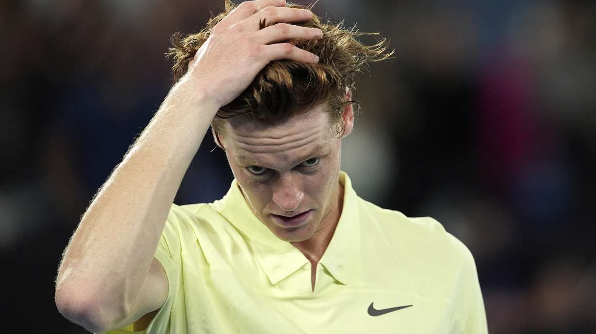 FILE - Jannik Sinner of Italy reacts after defeating Alexander Zverev of Germany in the men's singles final at the Australian Open tennis championship in Melbourne, Australia, Sunday, Jan. 26, 2025.