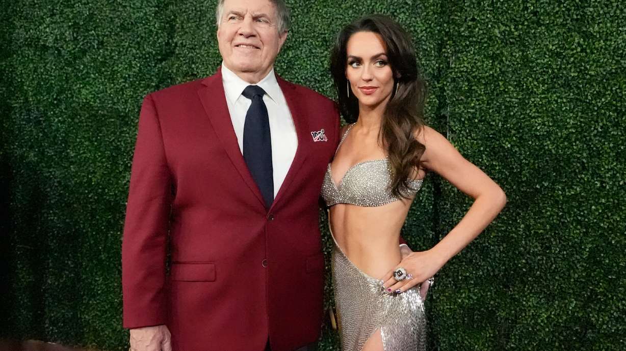 Former NFL head coach Bill Belichick and girlfriend Jordon Hudson, pose on the red carpet at the NFL Honors award show ahead of the Super Bowl 59 football game, Thursday, Feb. 6, 2025, in New Orleans.