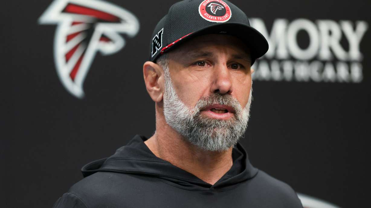 FILE - Atlanta Falcons defensive coordinator Jeff Ulbrich speaks with members of the media at the Falcons Training Camp, Jan. 27, 2025, in Flowery Branch, Ga.