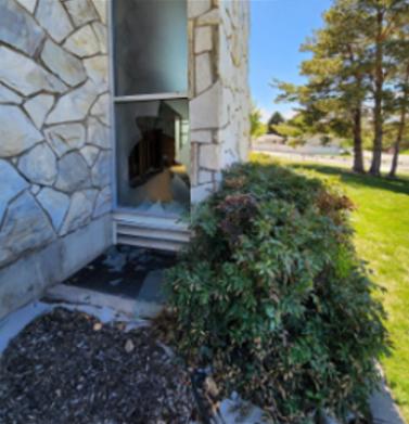 A window is broken out on a Latter-day Saint meetinghouse in Provo after police say someone broke in and vandalized the building. - Provo police