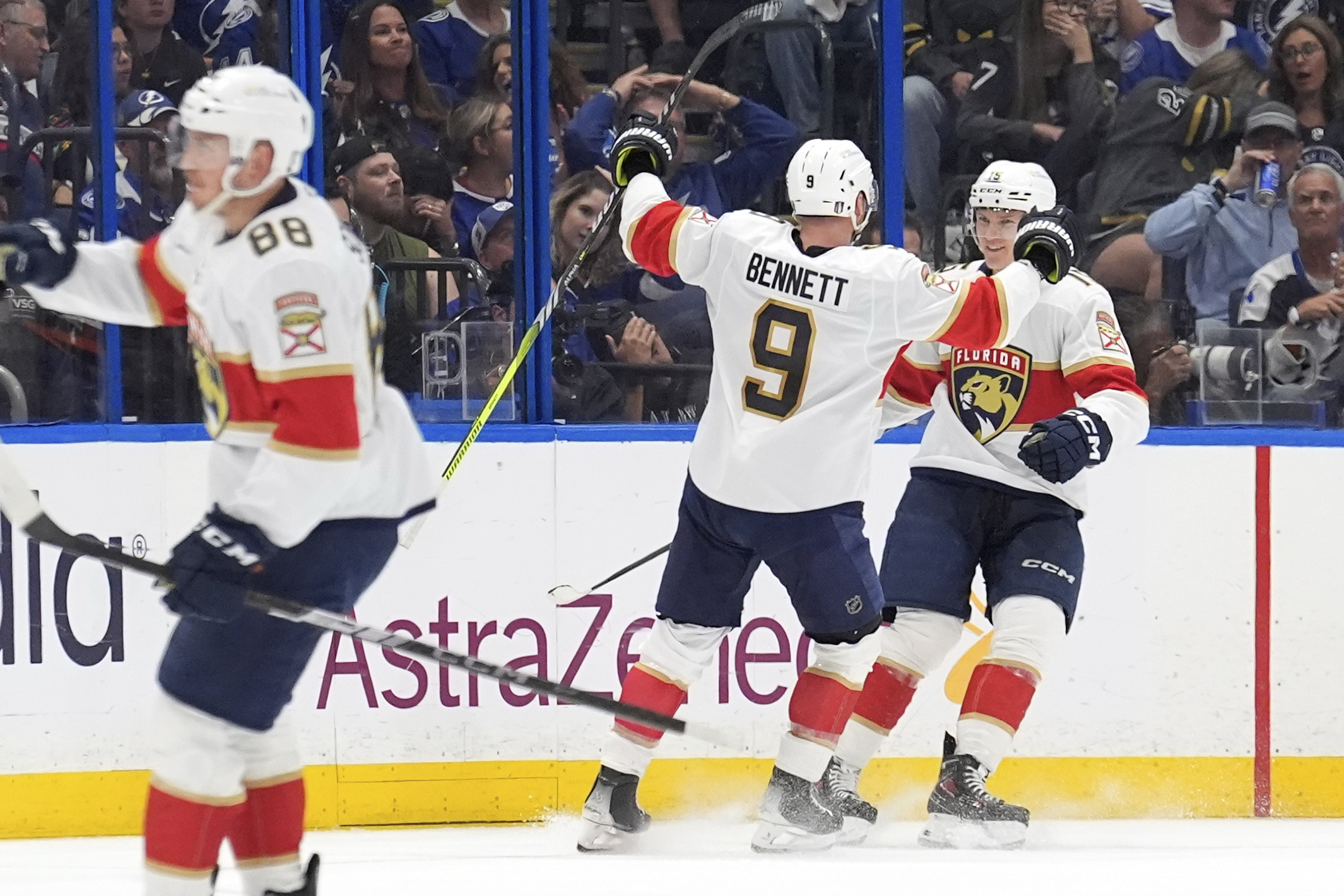 Florida Panthers center Sam Bennett (9) celebrates his goal against the Tampa Bay Lightning with center Anton Lundell (15) during the second period in Game 5 of an NHL hockey Stanley Cup first-round playoff series, Wednesday, April 30, 2025, in Tampa, Fla.