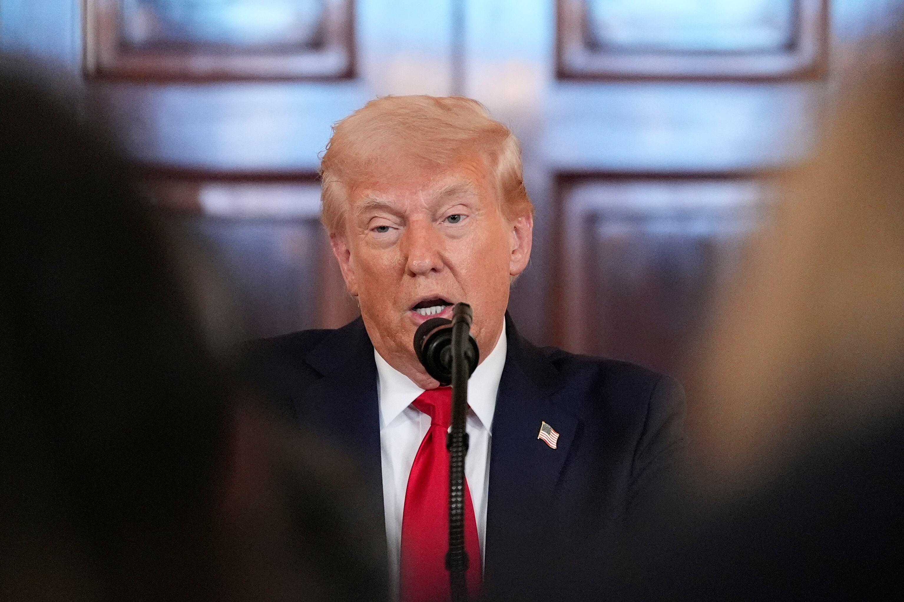 President Donald Trump speaks about investing in America in the Cross Hall of the White House on Wednesday.