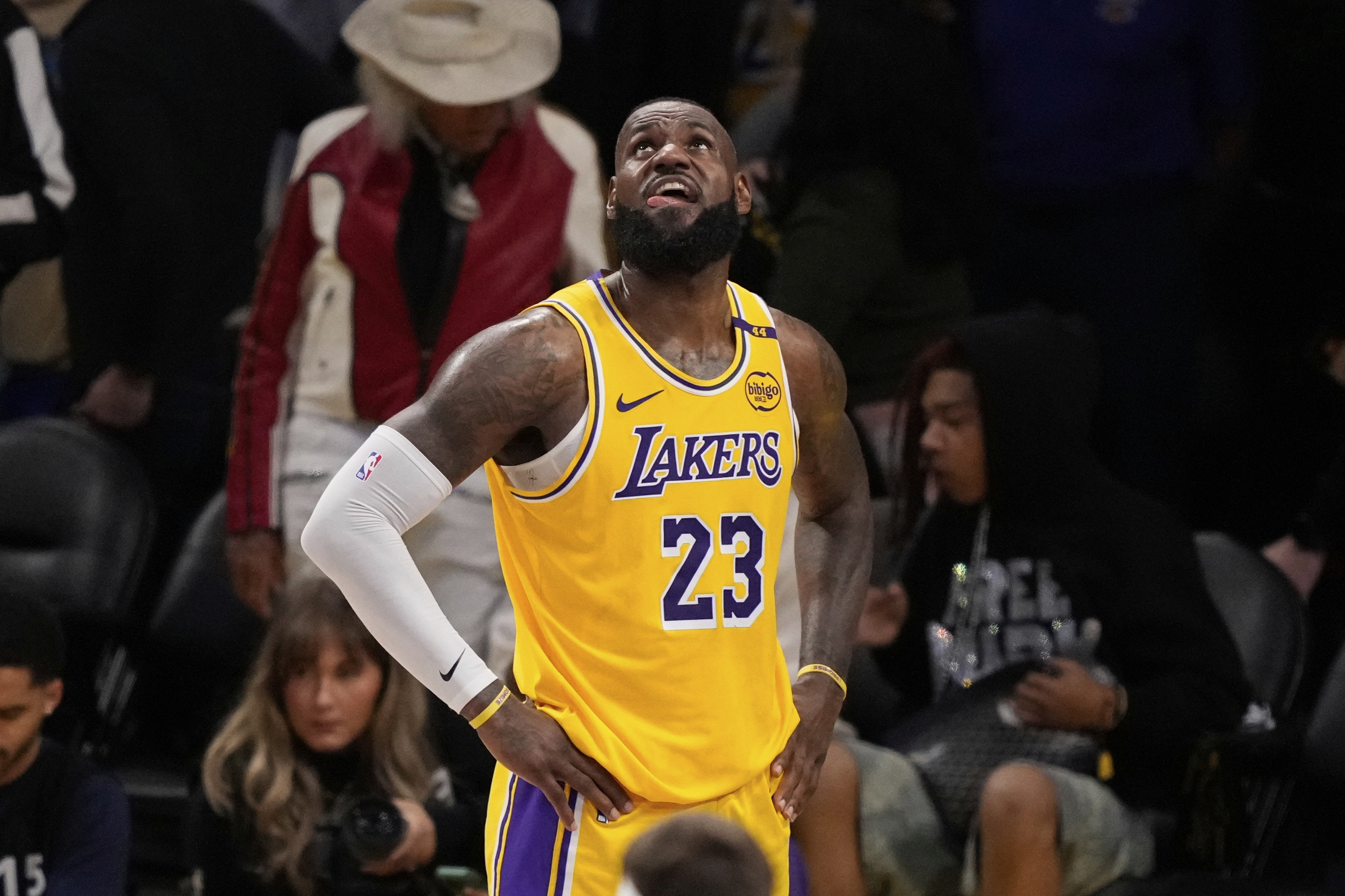 Los Angeles Lakers forward LeBron James looks up toward the scoreboard in the closing seconds in Game 5 of an NBA basketball first-round playoff series against the Minnesota Timberwolves, Wednesday, April 30, 2025, in Los Angeles.