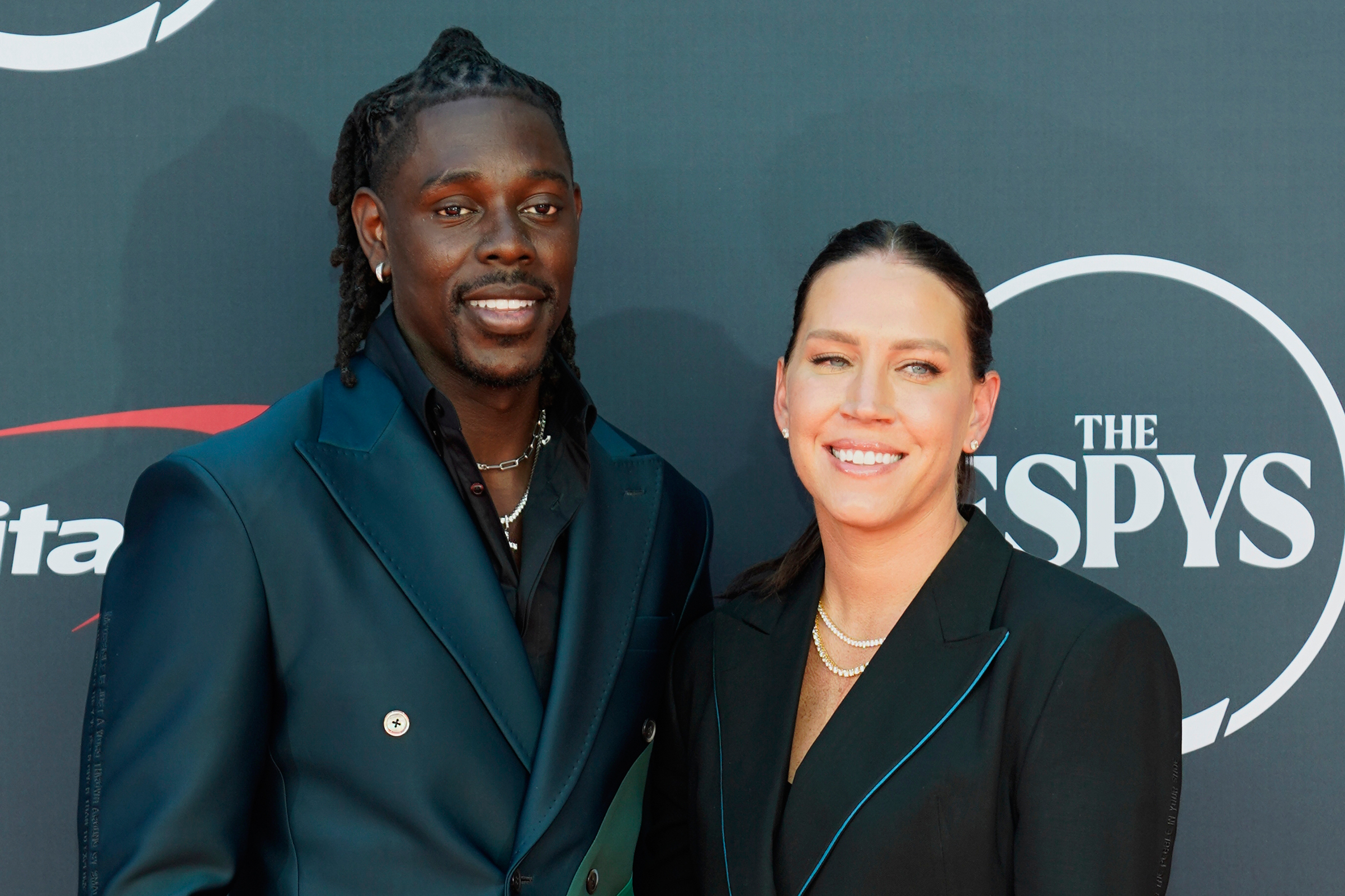 FILE - NBA basketball player Jrue Holiday, left, and former professional soccer player Lauren Holiday arrive at the ESPY awards on Wednesday, July 12, 2023, at the Dolby Theatre in Los Angeles.