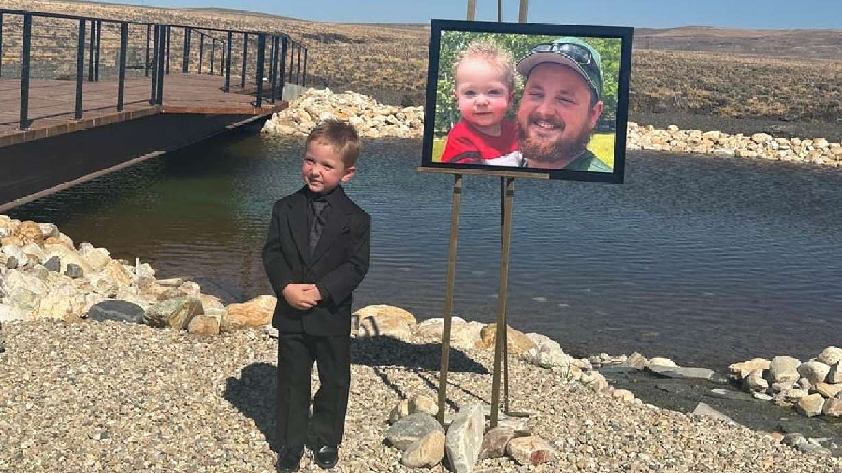 One of Dylan Wormsbaker’s children, Sawyer Wormsbaker, stands in front of a memorial for his father in undated photo. As an organ donor, Wormsbaker saved and changed the lives of 102 patients and their families nationwide.