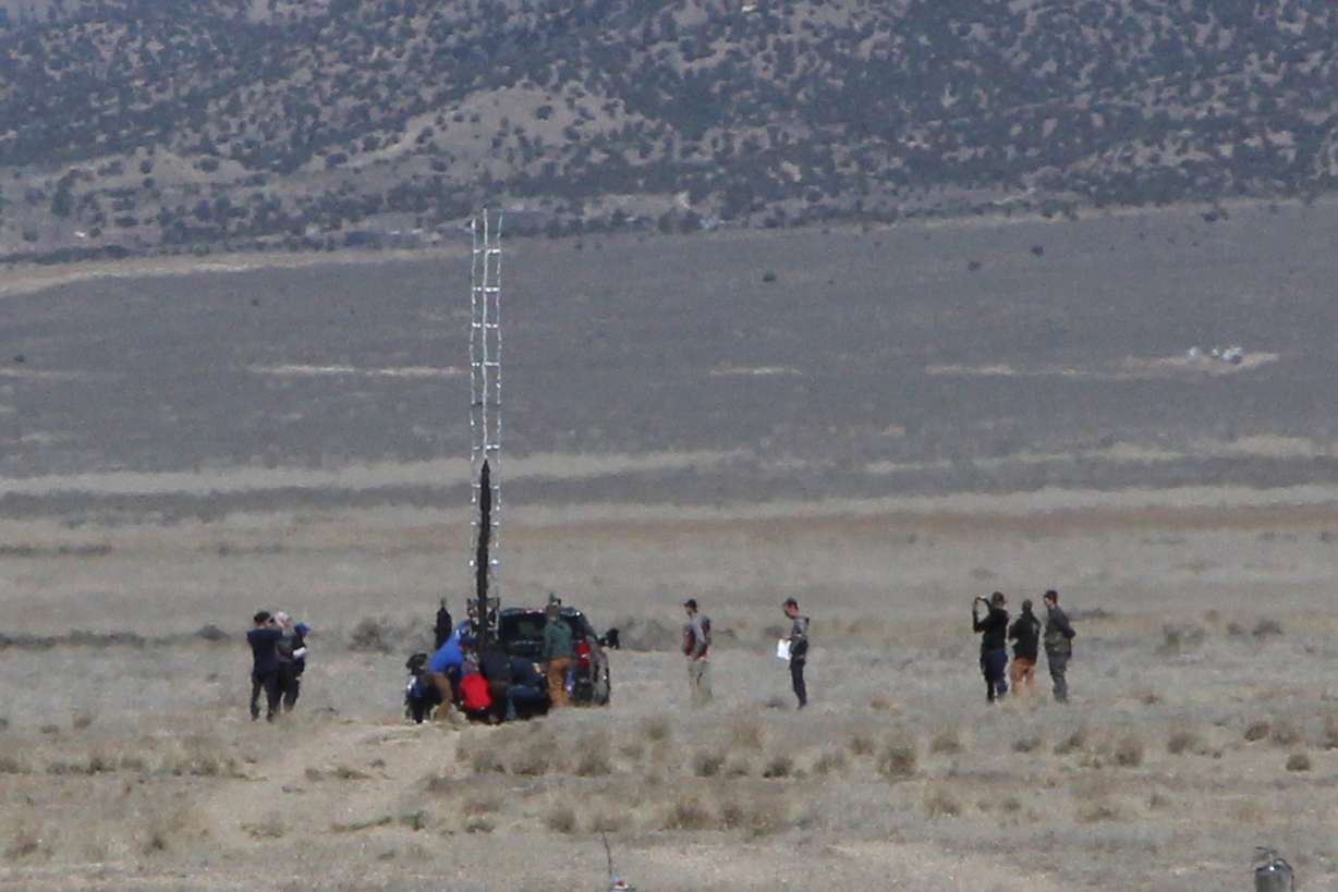 BYU Rocketry Club members prep to launch a hybrid motor rocket on April 5 in Tooele.