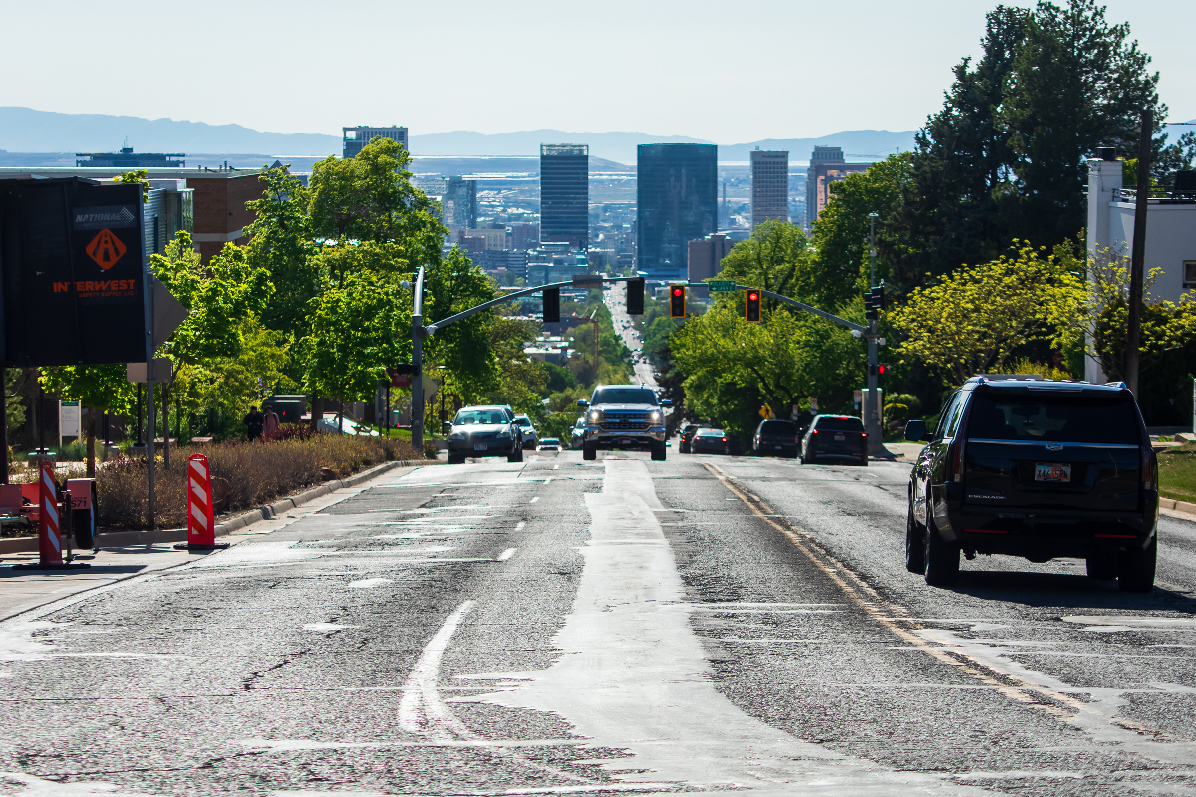 Vehicles travel along 100 South near North Campus Drive on Thursday. Drivers who regularly use the road near the University of Utah should be prepared for impacts over the next few months.