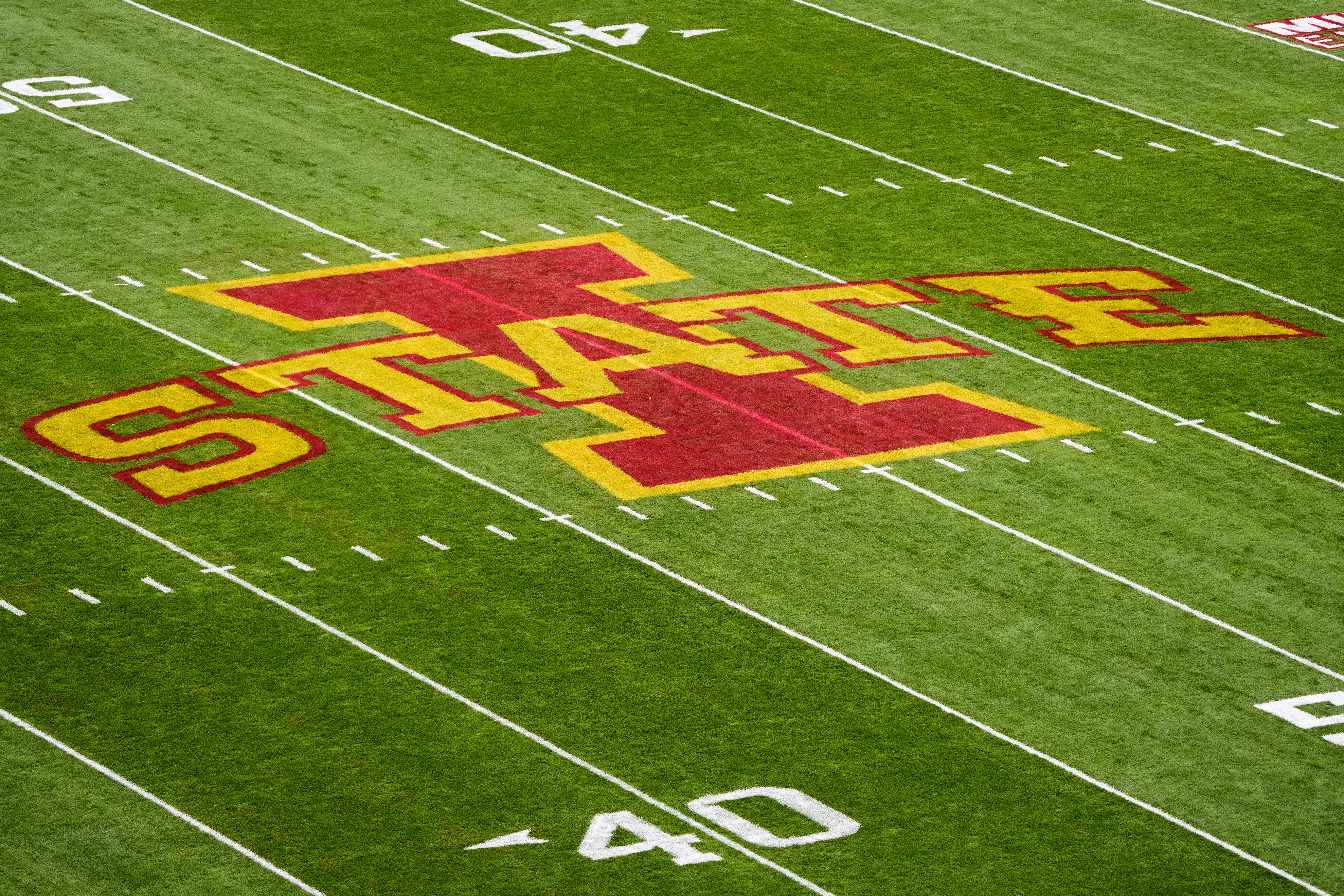 FILE - The Iowa State logo is displayed on the field before an NCAA college football game against West Virginia, Saturday, Nov. 5, 2022, in Ames, Iowa.